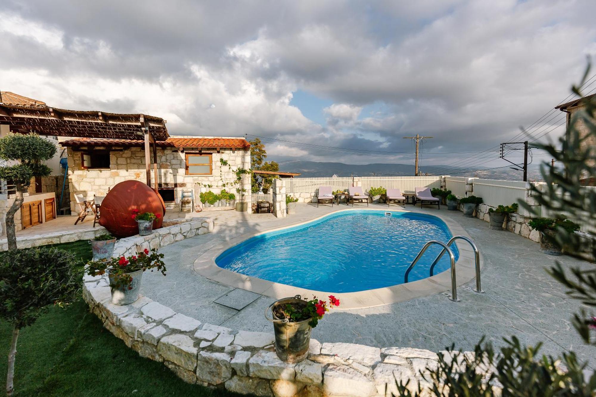 Holiday home Iliada's Traditional Stone House